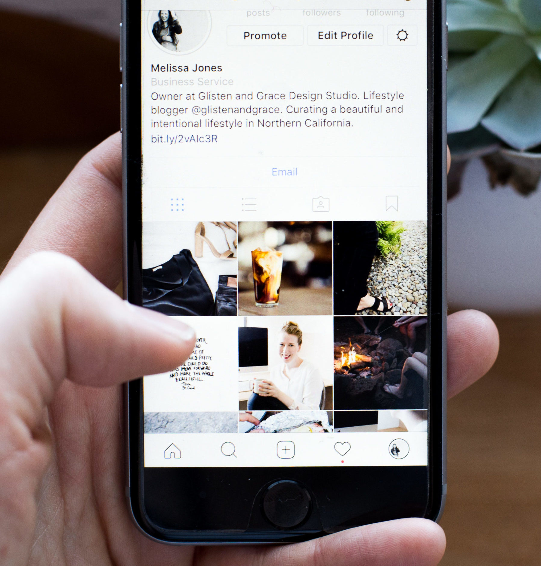 Phone shows instagram profile of web designer in Northern California